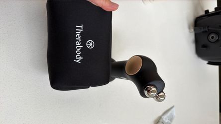 Therabody TheraFace Pro with Case with cooling and heating rind attachment