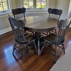Refinished Solid Oak Dining Set – 42” Round Claw Foot Table + 4 Carve-Back Chairs