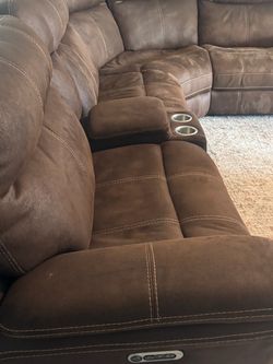 Recliner with power button