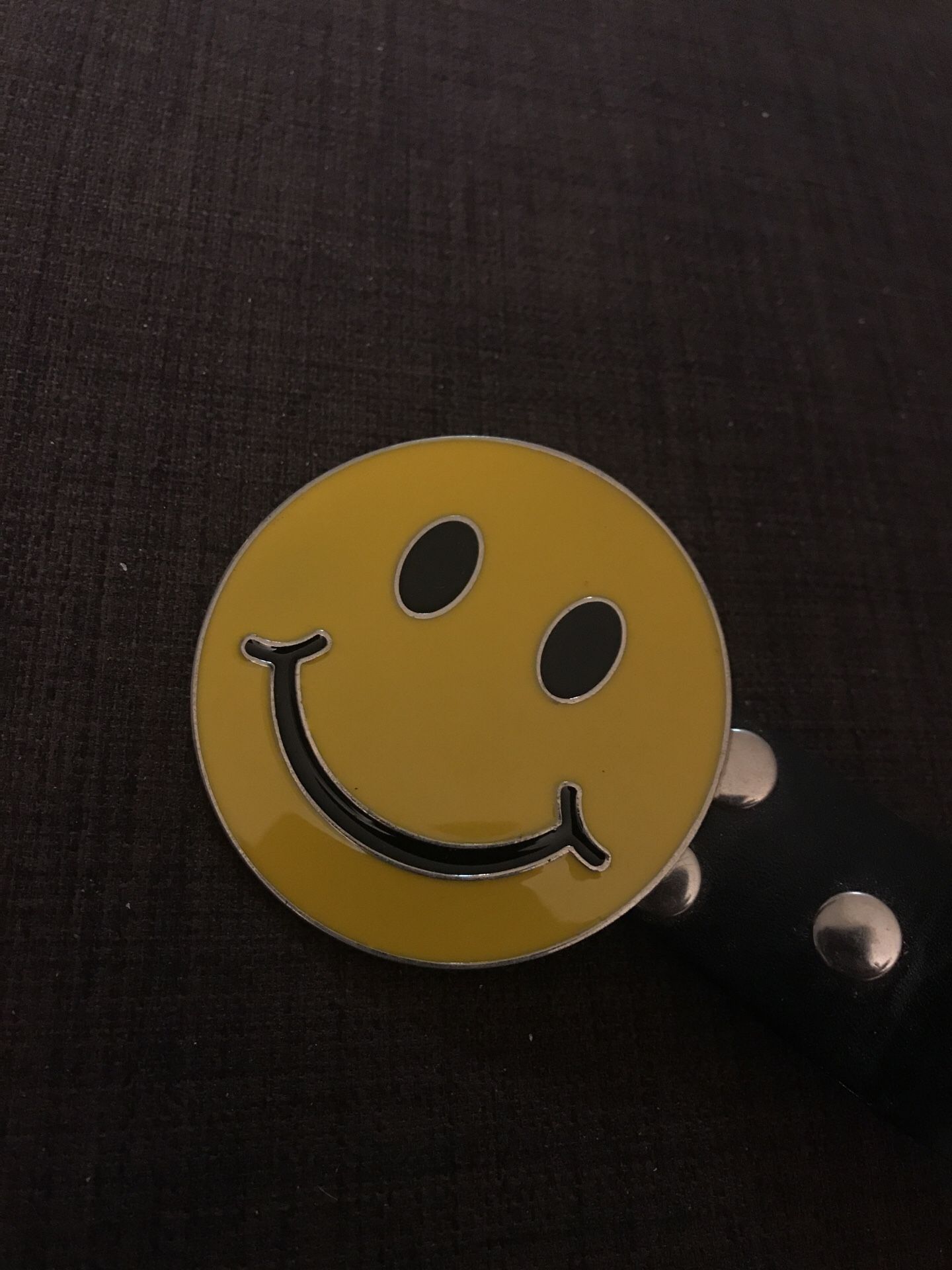 Smiley face belt buckle around 2.5 inch diameter