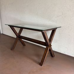 One Pottery Barn Table With Thick Glass Top And  Solid Wood Base