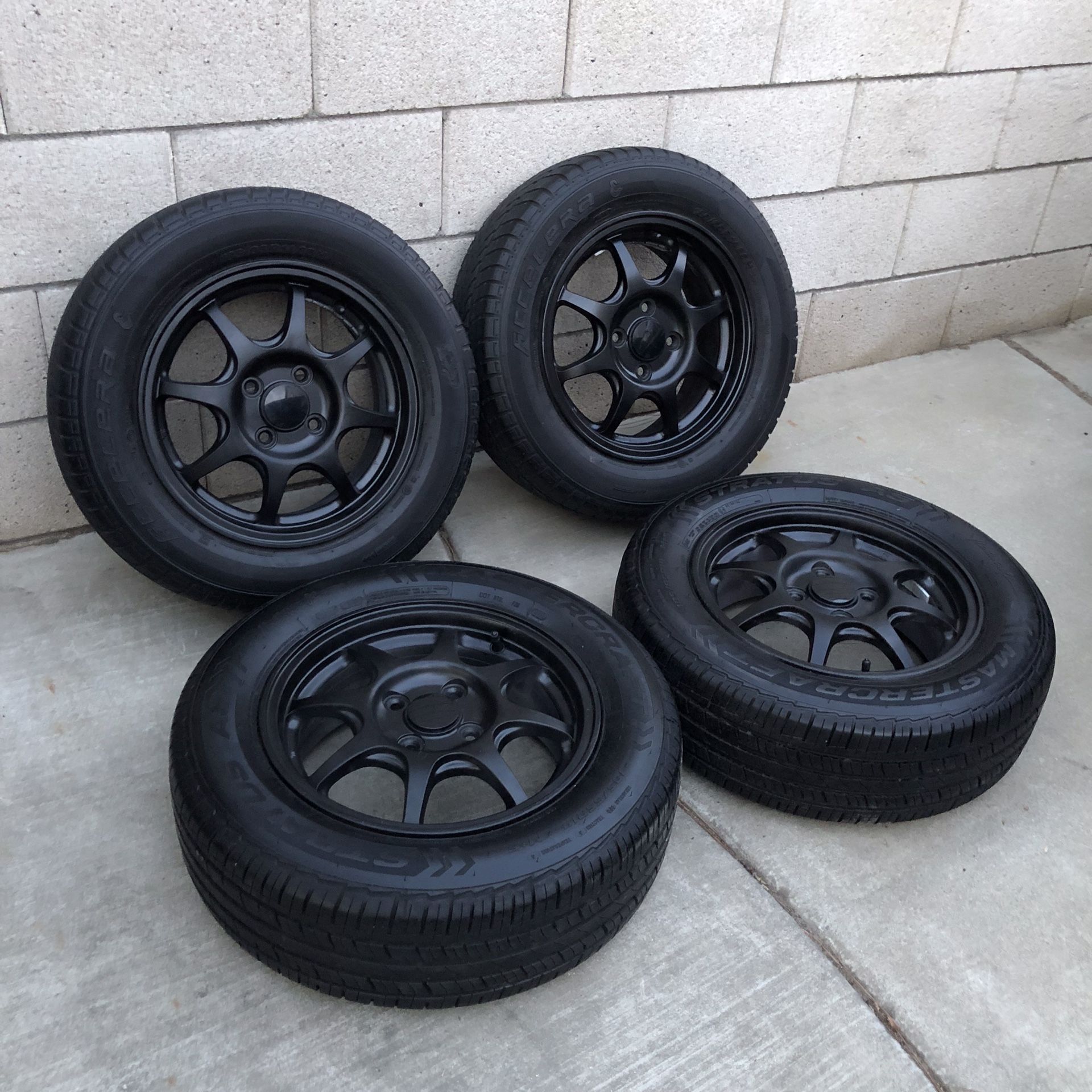 Honda Civic HX 14" OEM Factory Original made by Enkei Wheels Rims with Tires CRX Si DX HF EF EG EK VX DA DC. Painted matte black. They come exactly as