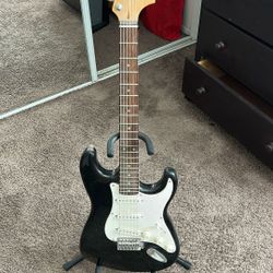 Electric Guitar With Stand