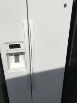 White 33 inch wide side-by-side refrigerator will deliver and install