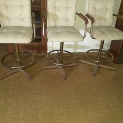 3 Perfect bar stools swivel.strudy 
 brass 
$495