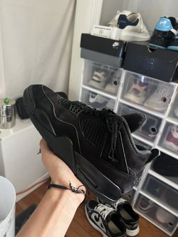 black cat jordan 4s