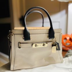 Coach Swagger 27 bag in a colorblock design