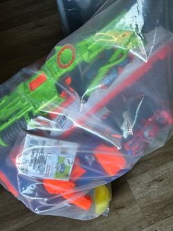Pile of nerf guns and other toys