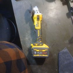 Dewalt 20 V, angle grinder And a sixty volt battery to go with it , i'm asking 100 Bucks 