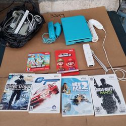 Sonic Blue Edition Nintendo will With All Sensors & Cables. 3 Pair of controllers. 5 Great Games for $200! Free Delivery. Im willing trade