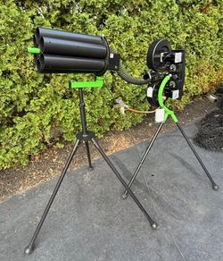 Spinball Wizard -2 Wheel Baseball Pitching Machine with Auto Feeder and balls.