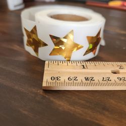 Holographic gold star stickers. 0.5"