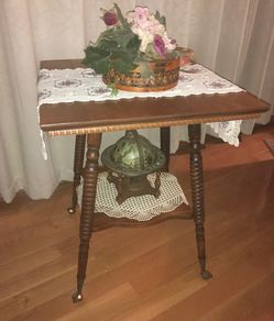 Antique accent table w/glass feet