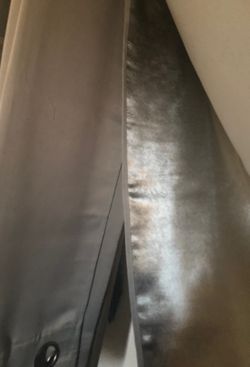 Two grey curtain panels