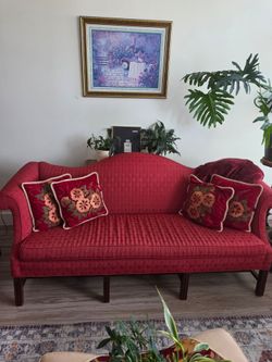 Red Camelback Sofa with Wood Legs
