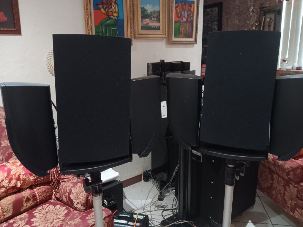 DEFINITIVE TECHNOLOGY PRO MONITOR SPEAKER MODEL ME0013-0038 AND FOUR BOSE SPEAKERS. WITH STANDS LIKE NEW