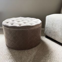 Round Ottoman tufted “velvet” like champagne color