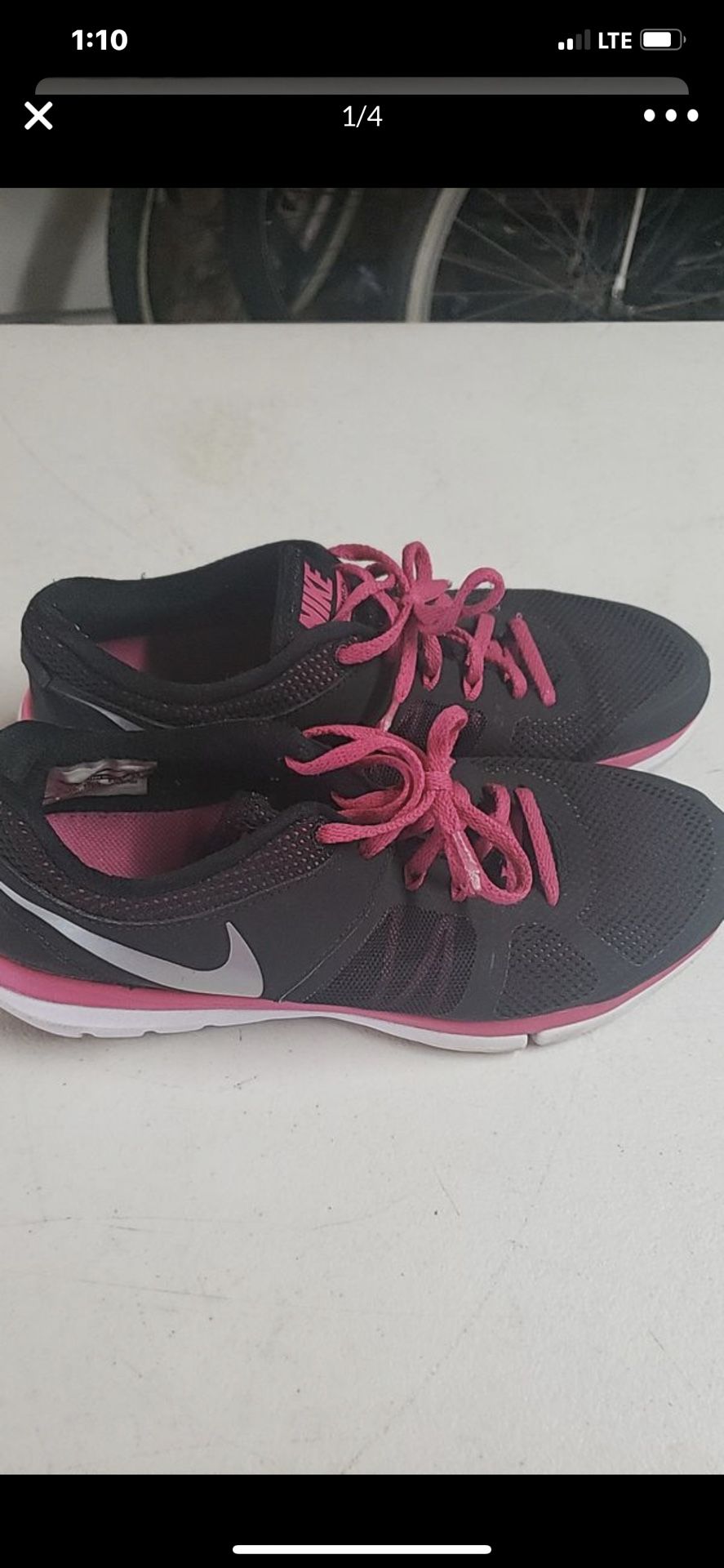 Black and pink women’s Nike shoes size 10