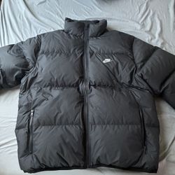 nike puffer jacket black size L