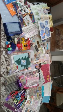 Hundreds of dollars of creative memory stencils paper cutter & punches stickers books & more. Like new been in storage asking 95