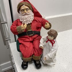 Clothtique santa with child figurine
