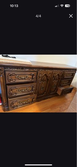 Ornate Wood Dresser with Carved Details