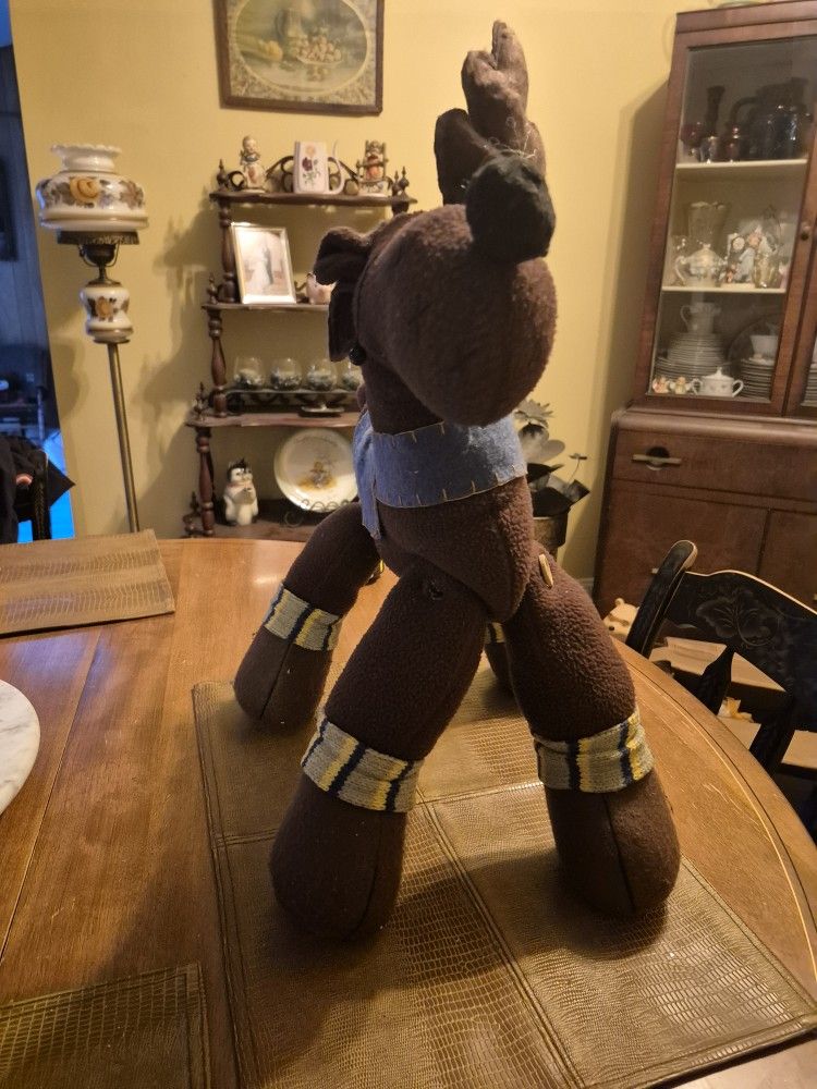 Plush reindeer with weighted paws 20"x12"