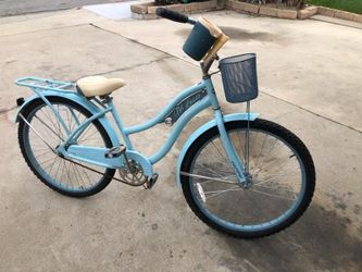 Blue woman's Huffy Nel Lusso Beach Cruiser