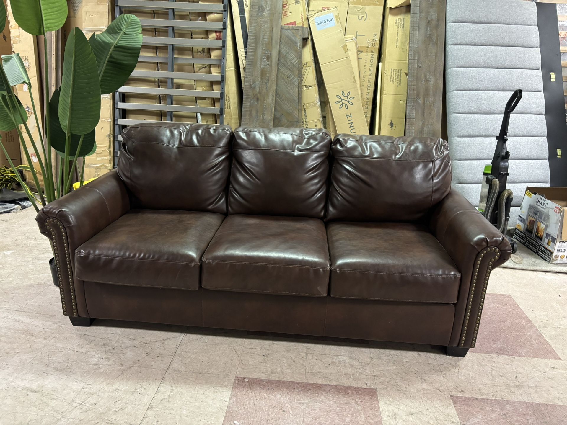 BROWN LEATHER SOFA BED , DELIVERY AVAILABLE
