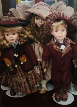 Porcelain-matching boy and girl twin set dolls