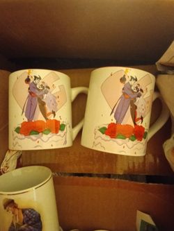 Box full of mugs cups showing these few different prices from $5 to $20