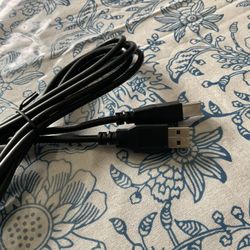 New USB-A to USB-B cable (a printer cable).
