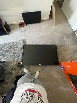 Television With Mounted Stand