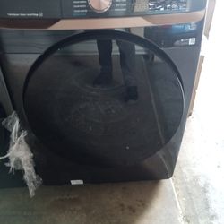 Like New Samsung Brushed Black Front Load Washer And Electric Dryer 