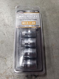 Dorman locking lug nut set. BNIB 711-321
