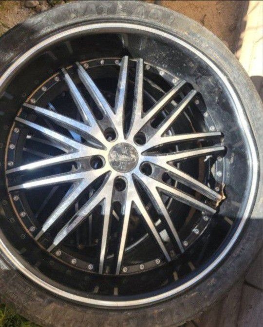I Have (2) 265/35/R22 5 Lugs Rims With Tires 75% Thread It Has A Dent  1 Rim  the  other  1 is ok. Both For $15 bolt pattern is 5x120