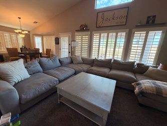 Grey sectional couch with down cushions  and chaise lounge