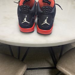 Red thunders brand new jordan 4s