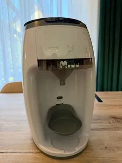 Momini MilkMagic Milk Maker—warranty valid through June 2028