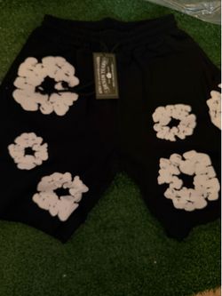 black and grey denim tear shorts