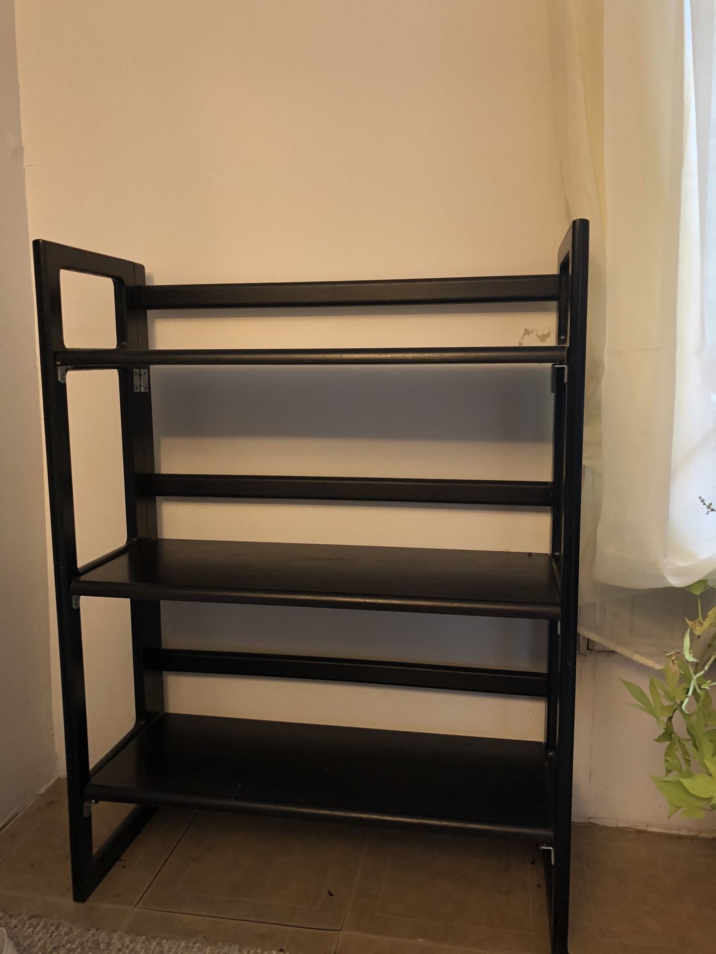Collapsible dark wood shelving unit
