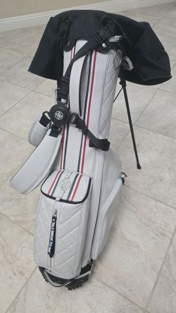 G fore light weight Woman's golf bag.
Good condition but leather melted little bit. 
Check last picture