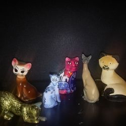 various vintage collectible cats figurines