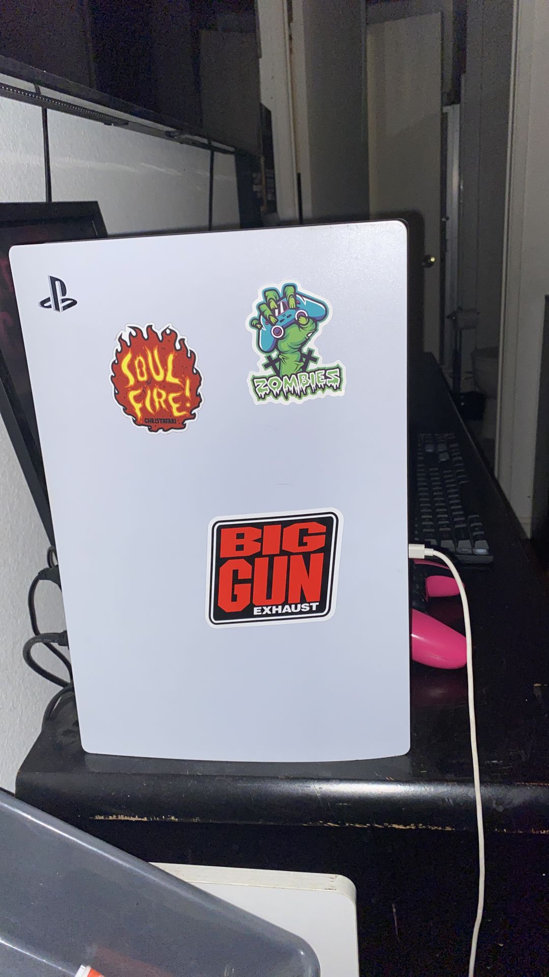 PlayStation five with three controllers, mouse and keyboard