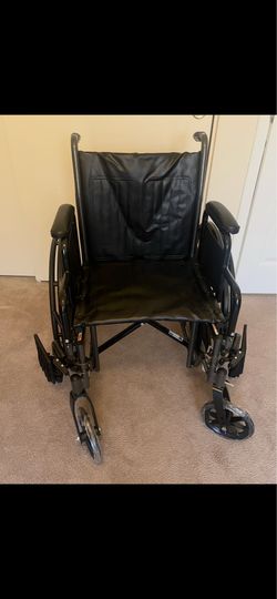 Black Folding Wheelchair with Footrests