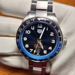 42mm Stainless Tag Heuer Autavia GMT COSC “Batman” featuring a Blue/ Black Bezel and Blue Dial (Ref: WBE511A.BA0650)