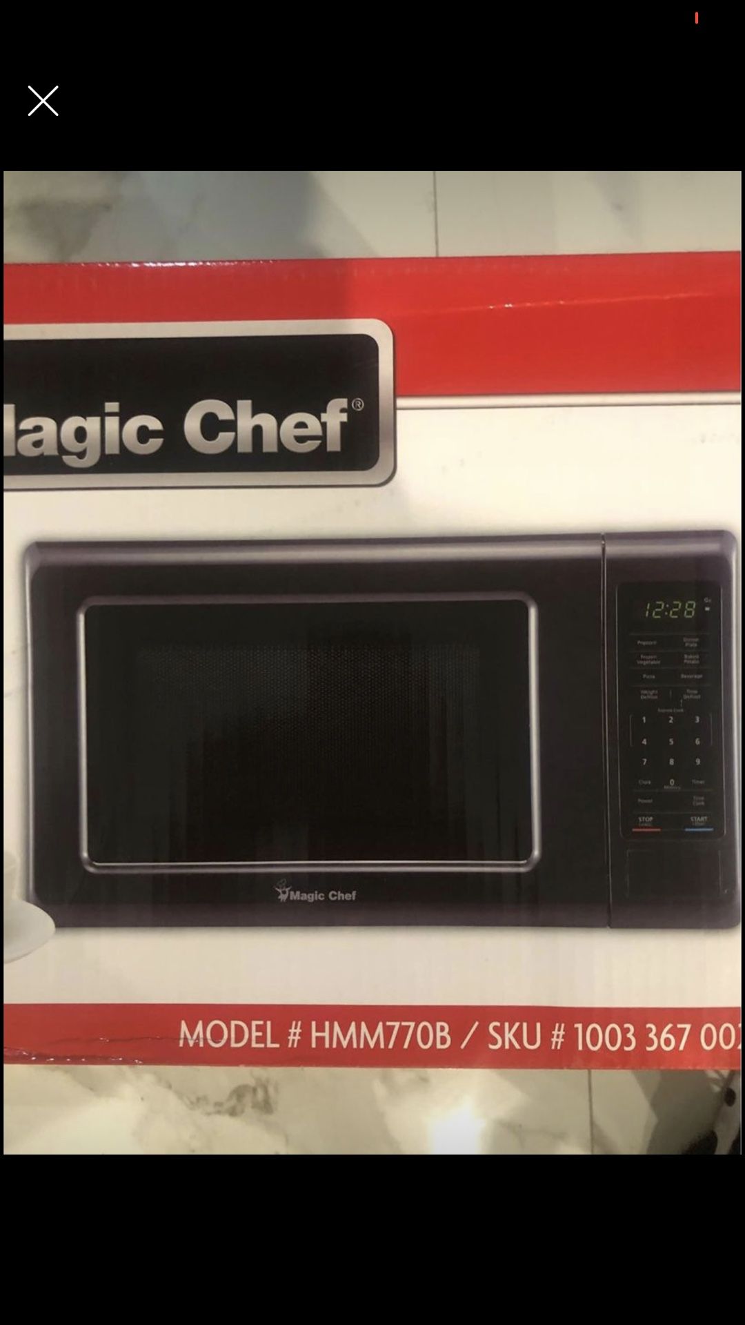 BRAND NEW MAGIC CHEF MICROWAVE