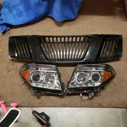 2006 Nissan FRONTIER BLACK GRILL AND HEADLIGHT $70