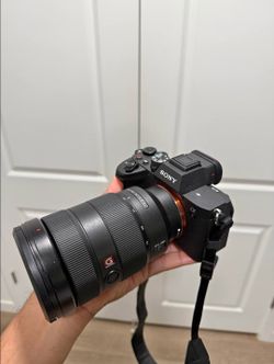 Sony A7IV camera with lens