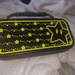 NINTENDO SWITCH WITH CASE AND 2 GAMES 